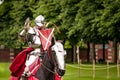 Armored knight suited for battle on horseback Royalty Free Stock Photo